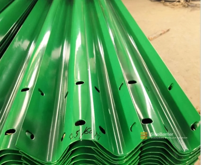 W-beam guardrail panels stacked at the SinoBarrier factory before galvanizing